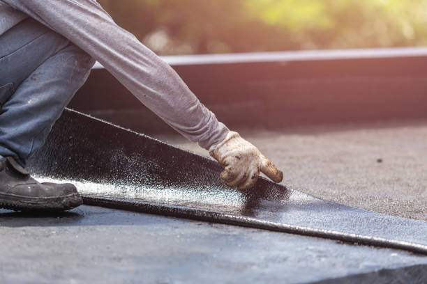Professional Basement Waterproofing technician working in Brinkhaven, OH